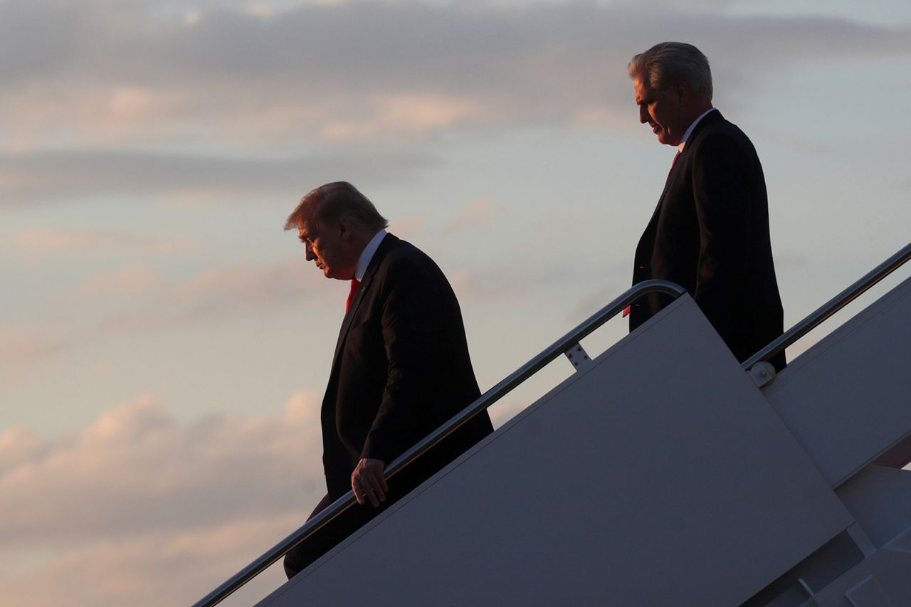 McCarthy trails Trump after Air Force One landed in Maryland in 2020.