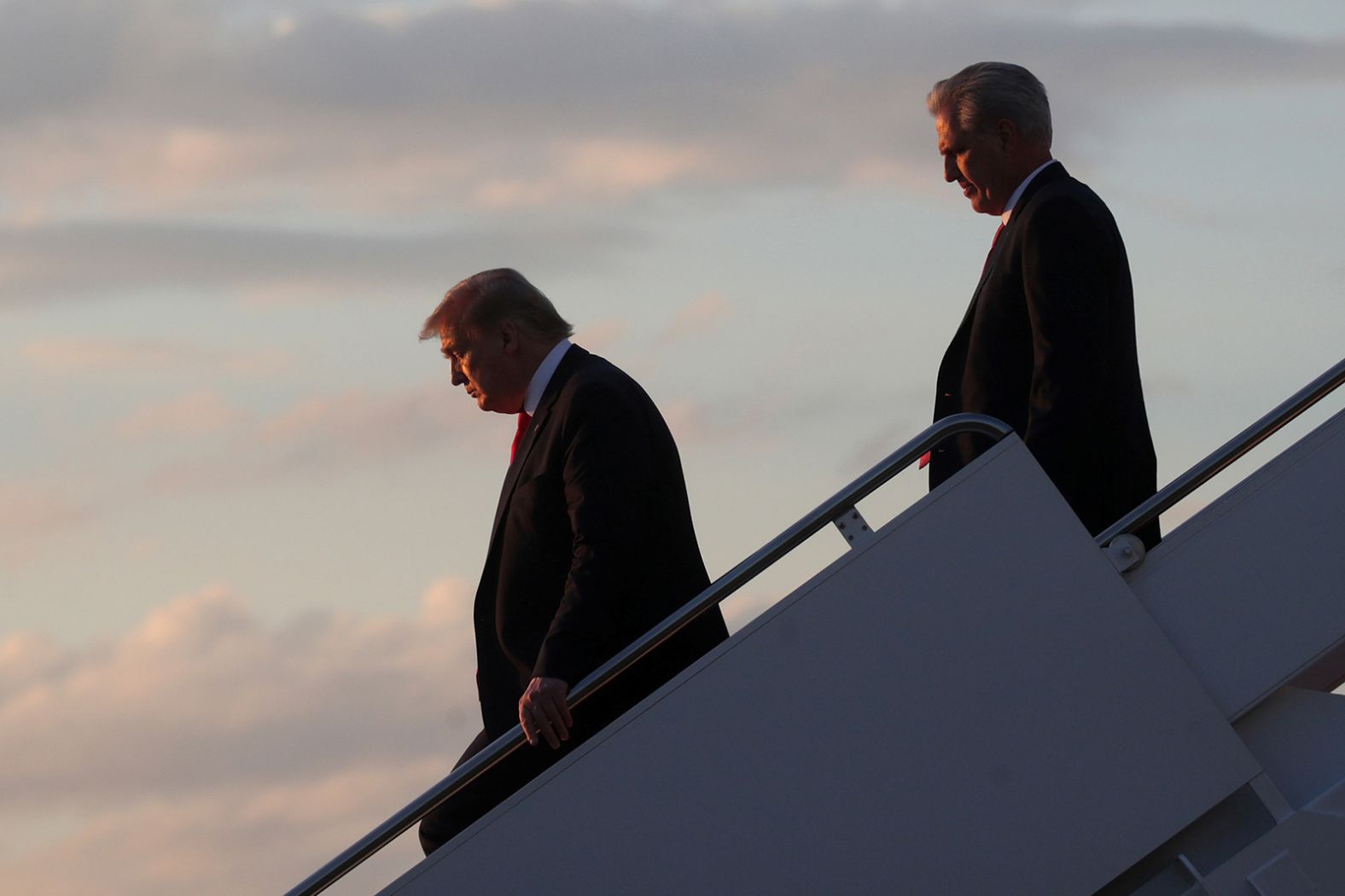 McCarthy trails Trump after Air Force One landed in Maryland in 2020.