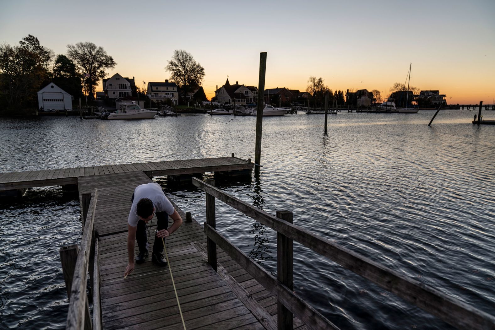 Moderator Andrew Williamson marks a campaign boundary line outside the Aspray Boat House in Warwick.