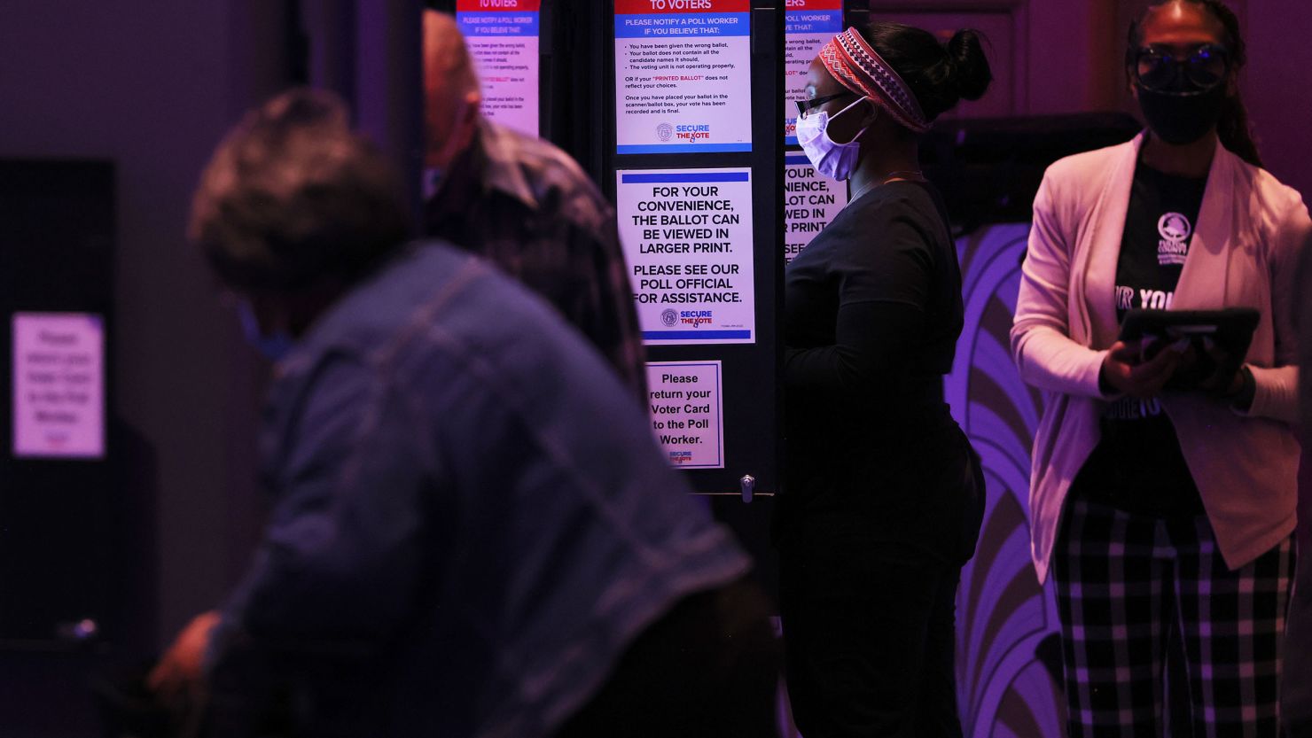 People cast their ballot during the Midterm Elections at Fox Theatre on November 8, 2022, in Atlanta, Georgia. 