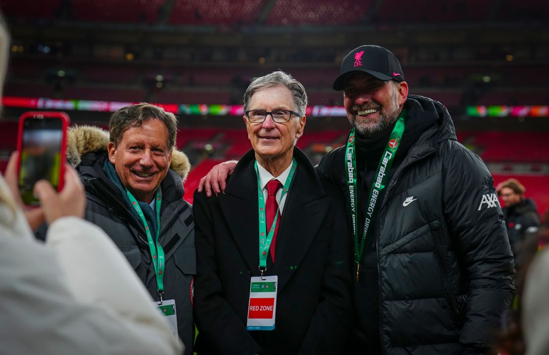 Klopp is pictured with Liverpool Chairman Tom Werner and club owner John W. Henry at Wembley Stadium in February 2022.