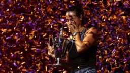 FORT WORTH, TEXAS - NOVEMBER 07: Caroline Garcia of France celebrates with the Billie Jean King Trophy after defeating Aryna Sabalenka of Belarus in their Women's Singles Final match during the 2022 WTA Finals, part of the Hologic WTA Tour, at Dickies Arena on November 07, 2022 in Fort Worth, Texas. (Photo by Katelyn Mulcahy/Getty Images)