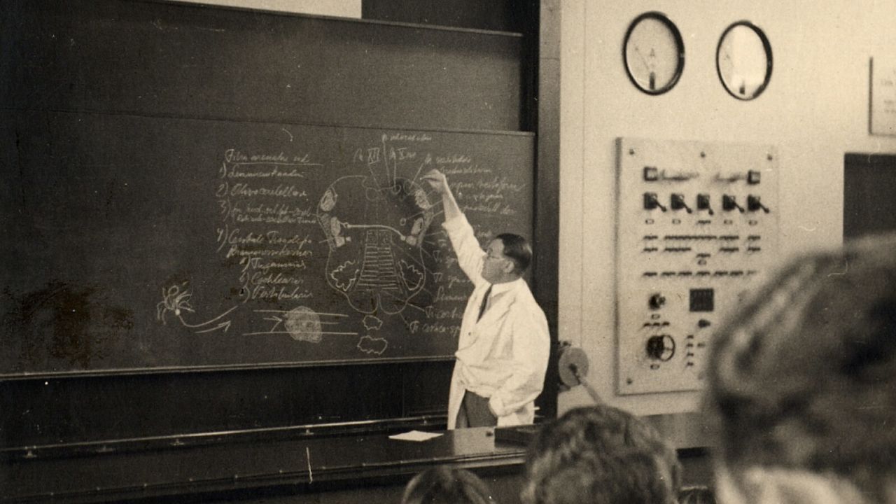 Dr. Larus Einarson, shown here teaching a class, was one of the co-founders of the brain collection at the Institute of Brain Pathology.