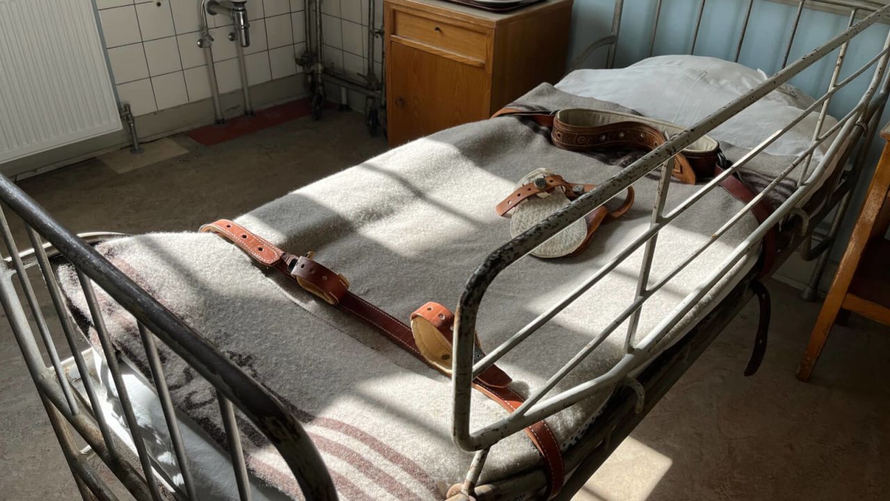 One floor of the Oringe psychiatric hospital is now a museum, which displays medical treatments and patient rooms such as this one. 