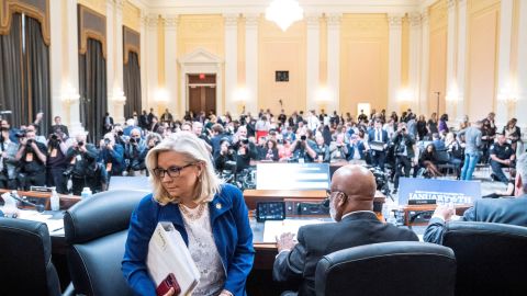 Vice Chair Liz Cheney, R-Wyoming, and Chairman Bennie Thompson, D-Mississippi, stand to depart during a break as the House select committee investigating the January 6 attack on the US Capitol holds a hearing on Capitol Hill on October 13, 2022 in Washington.