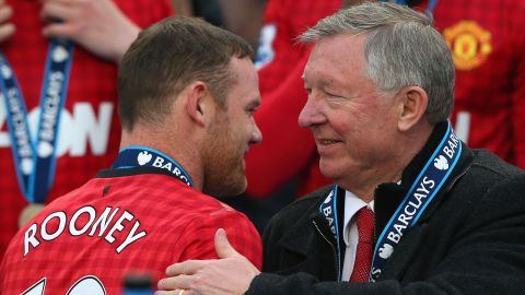 Then Manchester United manager Sir Alex Ferguson congratulates Wayne Rooney after his final Premier League title win in 2013. 