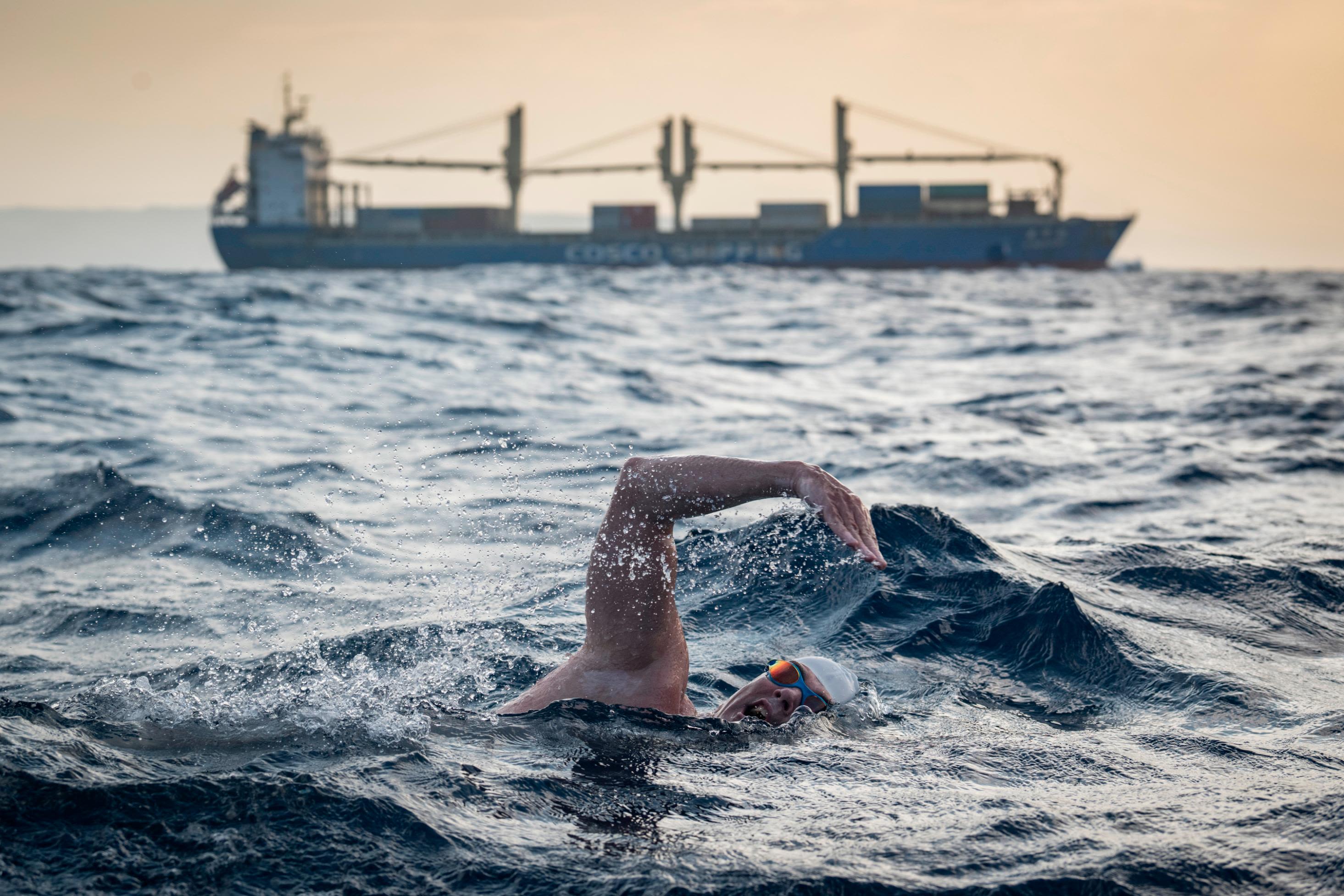 How Lewis Pugh braved sharks and shipping containers in the world's first  swim across the Red Sea