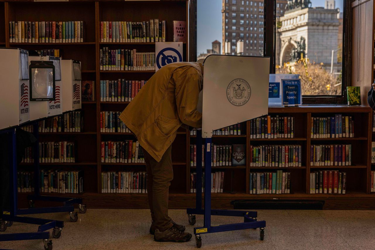 Voters cast their ballots at the Brooklyn Public Library in New York.