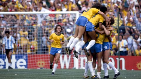 Brazil players celebrate a goal against Argentina.