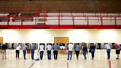 DENVER, CO - NOVEMBER 08: People vote at Denver East High School on November 8, 2022 in Denver, United States. After months of candidates campaigning, Americans are voting in the midterm elections to decide close races across the nation. (Photo by Michael Ciaglo/Getty Images)