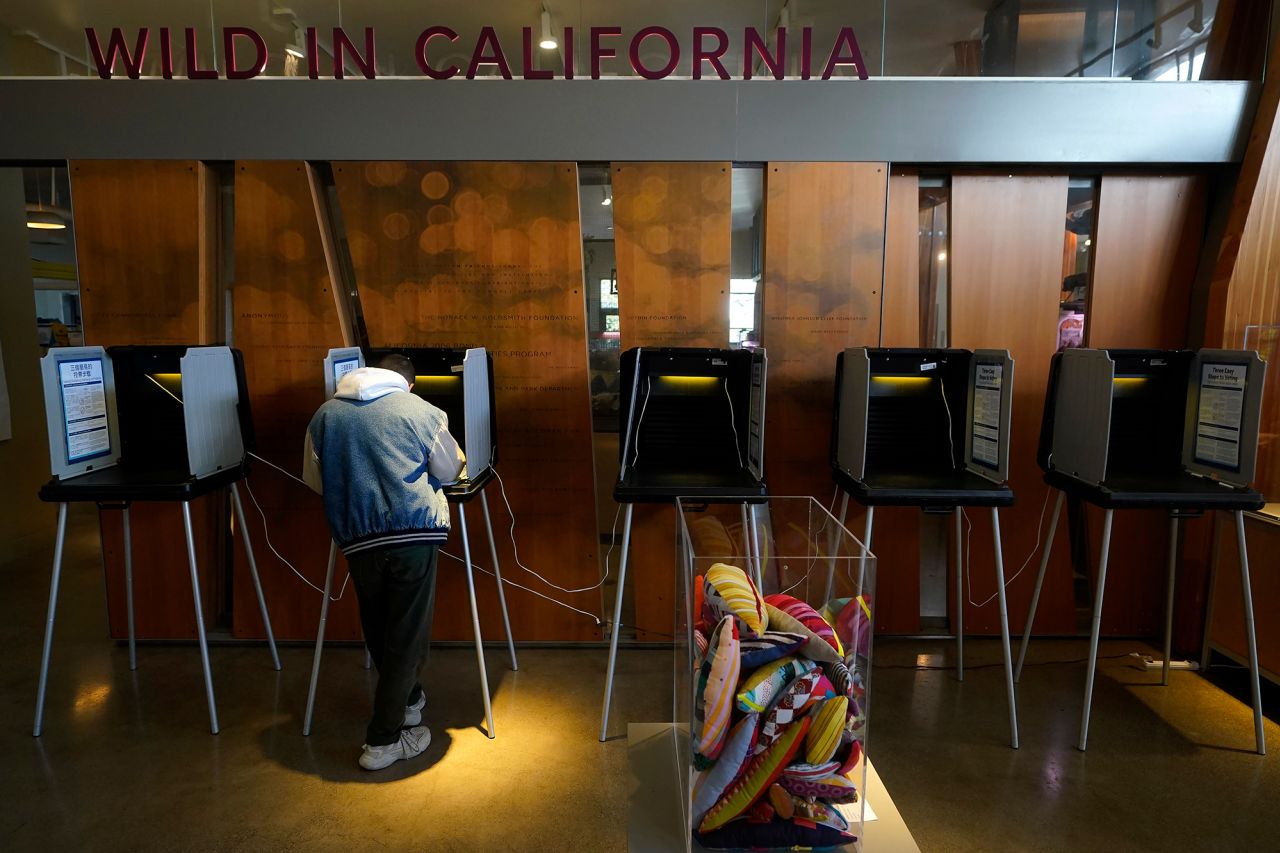 Andre Villasenor fills out his ballot while voting at the Randall Museum in San Francisco on Tuesday.