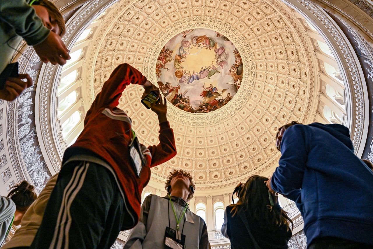 Visitors take photos inside the US Capitol Rotunda on Election Day.