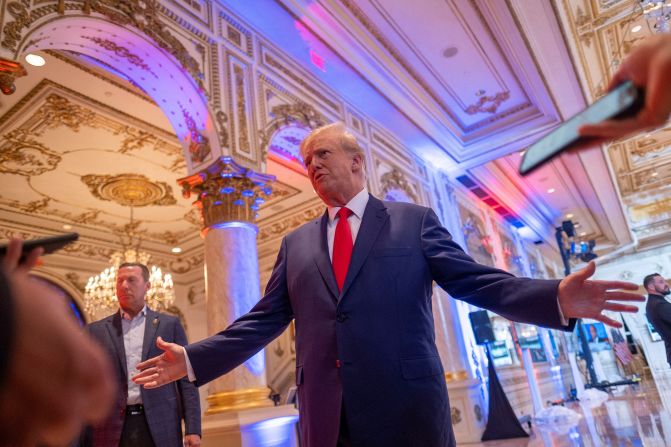 Trump talks to the press on the grounds of his Mar-a-Lago resort in Palm Beach, Florida, on Election Day. Earlier in the day he <a  target="_blank">predicted a "great night" for Republicans</a> and confirmed that he voted for Florida Gov. Ron DeSantis.