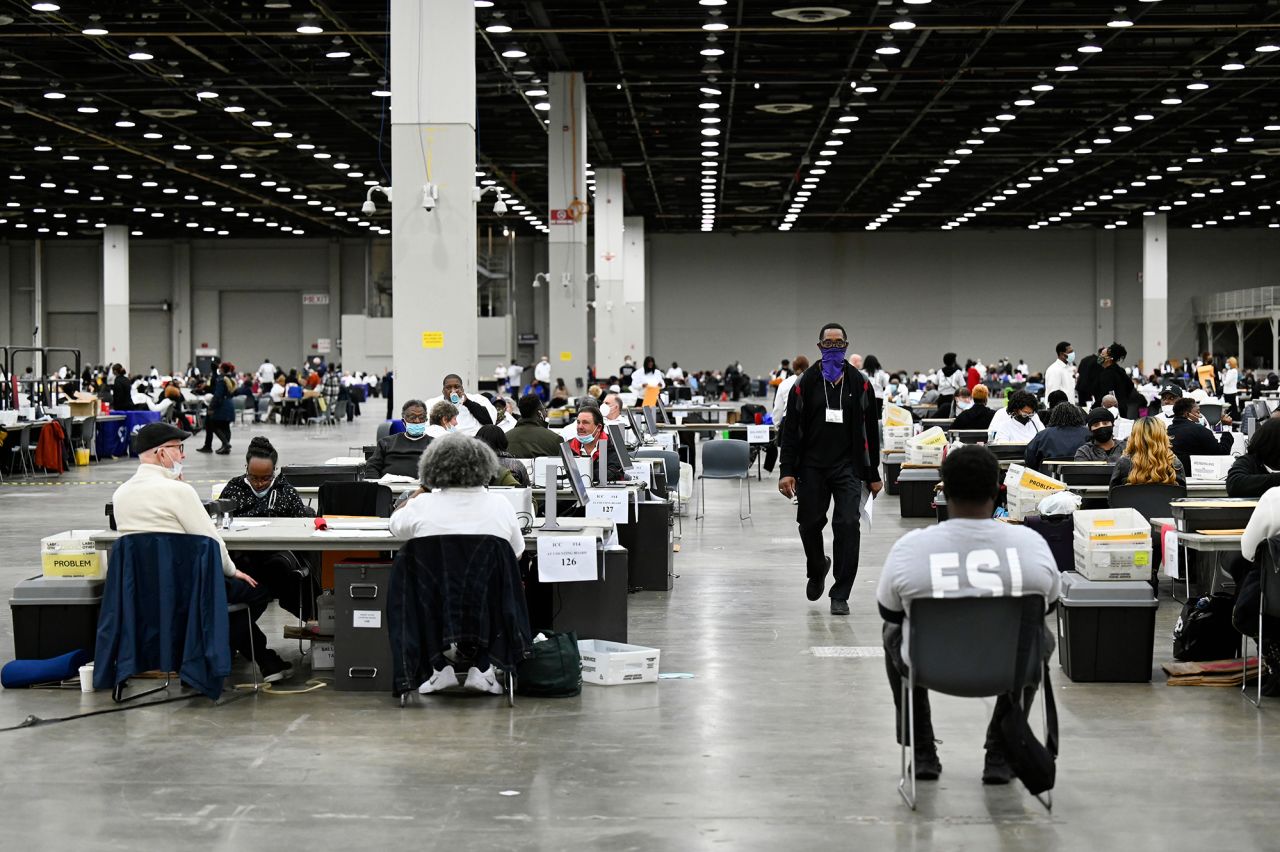 Workers process absentee ballots in Detroit on Tuesday.