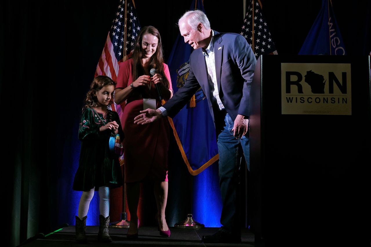US Sen. Ron Johnson wishes his granddaughter Marit a happy seventh birthday during an election night party in Neenah, Wisconsin. Johnson, a Republican, is running for reelection against Lt. Gov. Mandela Barnes.