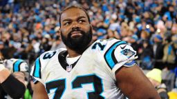 Michael Oher #73 of the Carolina Panthers watches play against the Arizona Cardinals during the NFC Championship Game at Bank Of America Stadium on January 24, 2016 in Charlotte, North Carolina.