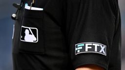 The FTX logo on the umpire's uniform during the game between the Washington Nationals and the Colorado Rockies at Nationals Park on May 26, 2022 in Washington, DC. 