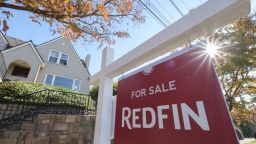 A Redfin real estate yard sign is pictured in front of a house for sale on October 31, 2017 in Seattle, Washington. 