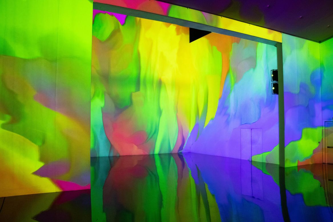 The exhibition spaces are bathed in color and sound.