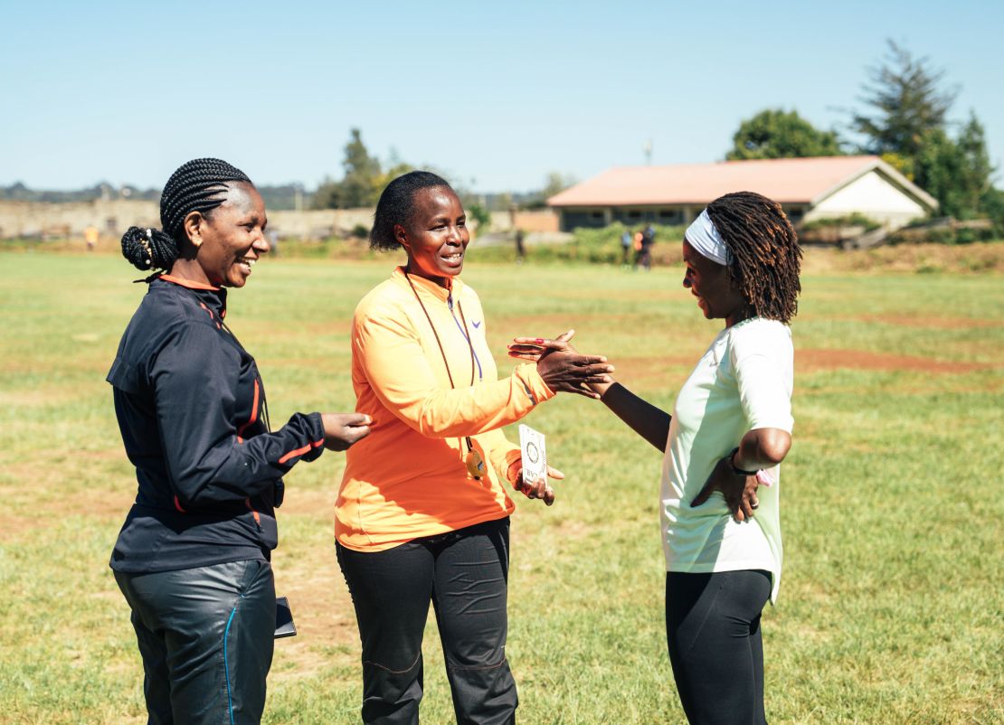 Ngugi (right) balances her marathon career with overseeing Nala Track Club.