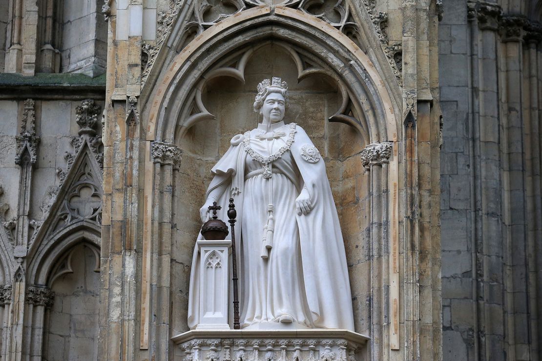 The statue of Queen Elizabeth II sits on the west front of York Minster in northern England.