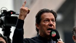 Pakistan's former prime minister Imran Khan (C) addresses his supporters during an anti-government march towards capital Islamabad, demanding early elections, in Gujranwala on November 1, 2022. (Photo by Arif ALI / AFP) (Photo by ARIF ALI/AFP via Getty Images)