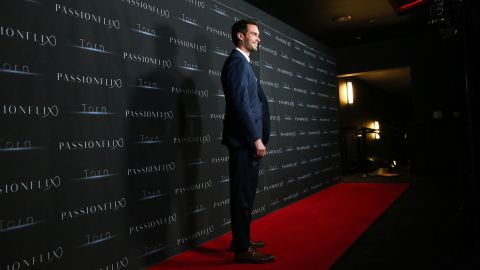 Kevin Joy on the red carpet at the premiere of Passionflix's 