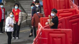A view of the temporary wall enclosing a residential block regarded as of high Covid-19 infection risk in Guangzhou in south China's Guangdong province Wednesday, Nov. 09, 2022.  (FeatureChina via AP Images)