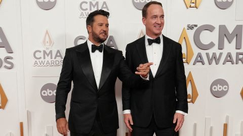 Luke Bryan and Peyton Manning, hosts of the 56th Annual CMA Awards, arrive at Bridgestone Arena, in Nashville, Tennessee on November 9, 2022.