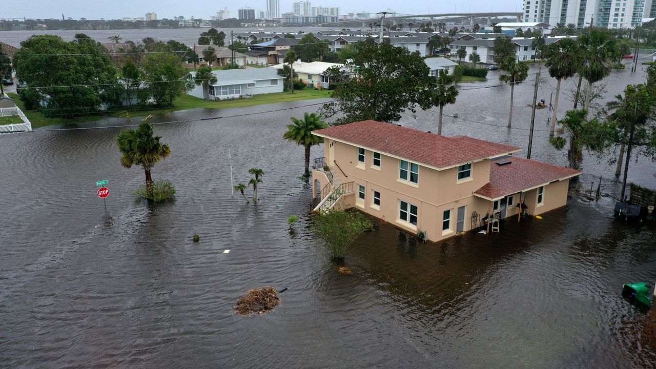DAYTONA BEACH, FLORIDA - NOVEMBER 10: In this aerial view, flood water surround a building after Hurricane Nicole came ashore on November10, 2022 in Daytona Beach, Florida.  Nicole came ashore as a Category 1 hurricane before hitting Florida's east coast. (Photo by Joe Raedle/Getty Images)