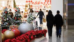 Black Friday shoppers walk through the Westfield Oakridge mall in San Jose, Calif., on Friday morning, Nov. 26, 2021. 