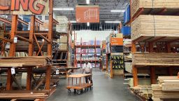 A person shops in the lumber section of a Home Depot on September 13, 2022 in Huntington Park, California. 