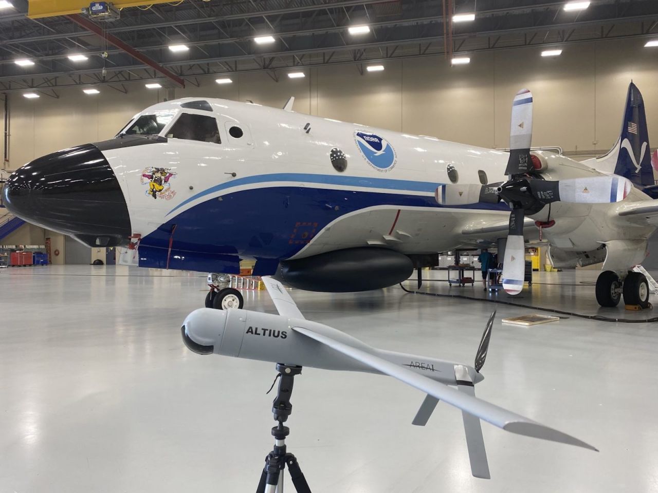 The Hurricane Hunters have a new tool at their disposal. In September 2022, for the first time, the NOAA deployed an Altius-600 uncrewed aircraft system -- pictured in the foreground. It has a range of 275 miles and can reach areas of a storm that are too dangerous for humans.