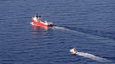 An aerial photo taken on November 10, 2022 shows the humanitarian ship Ocean Viking escorted by a military vessel sailing off the coast of northern Corsica en route to Toulon with migrants on board near Rogliano, on the French Mediterranean island of Corsica . 