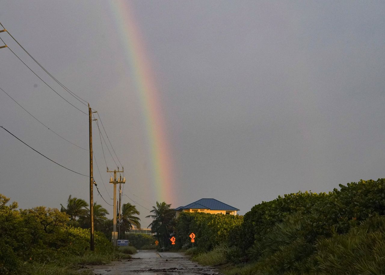 A rainbow is seen over Hutchinson Island on Thursday.