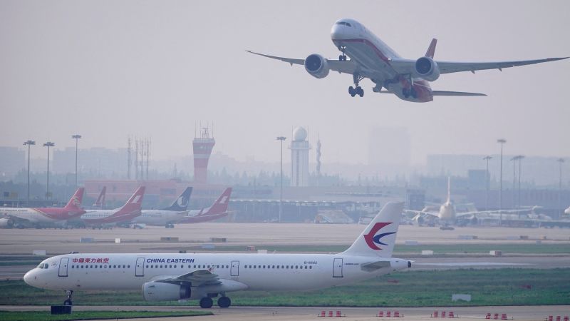 China scraps Covid flight bans, cuts quarantine for inbound travelers | CNN Business