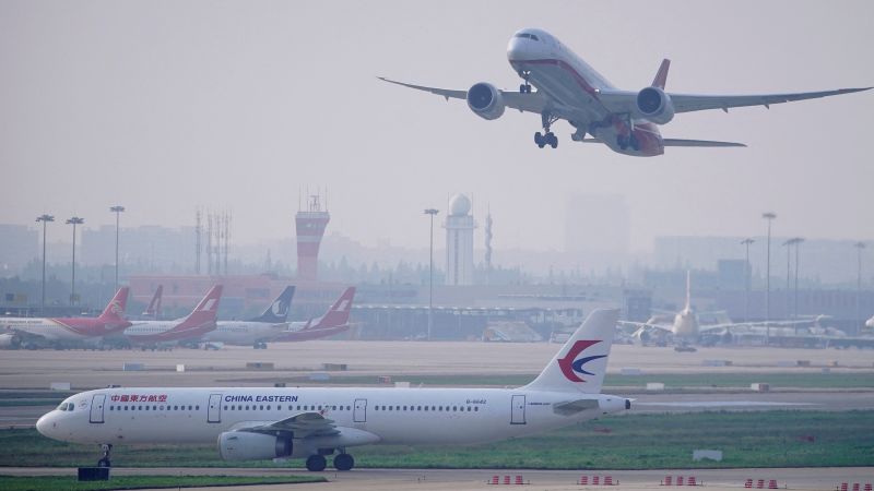 China scraps Covid flight bans, cuts quarantine for inbound travelers China scraps Covid flight bans, cuts quarantine for inbound travelers