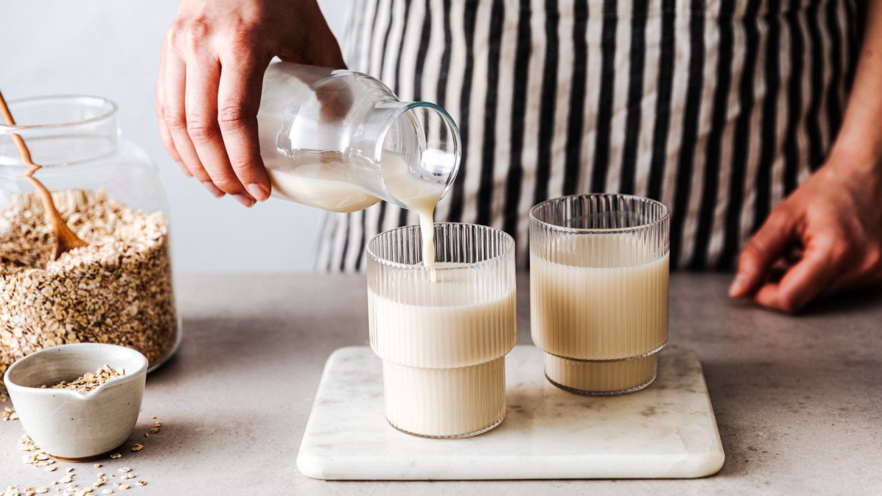 Plant-based milks come in a variety of options. Oat milk, shown here, has 1 to 3 grams of protein per serving, compared with 8 grams from dairy milk.