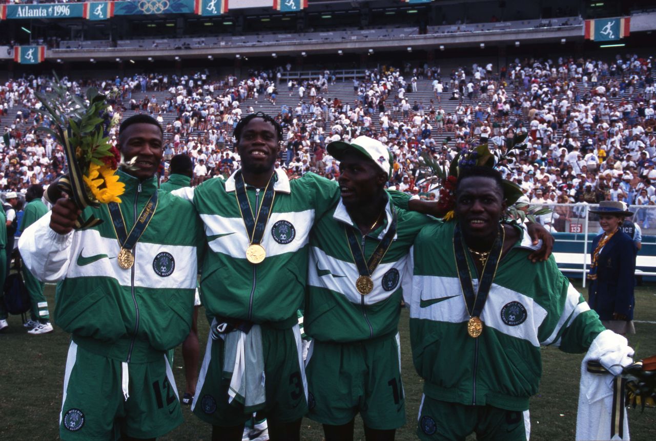 Abiodon Obafemi, Taribo West, Mobi Oparaku and Wilson Oruma sporting their gold medals. 