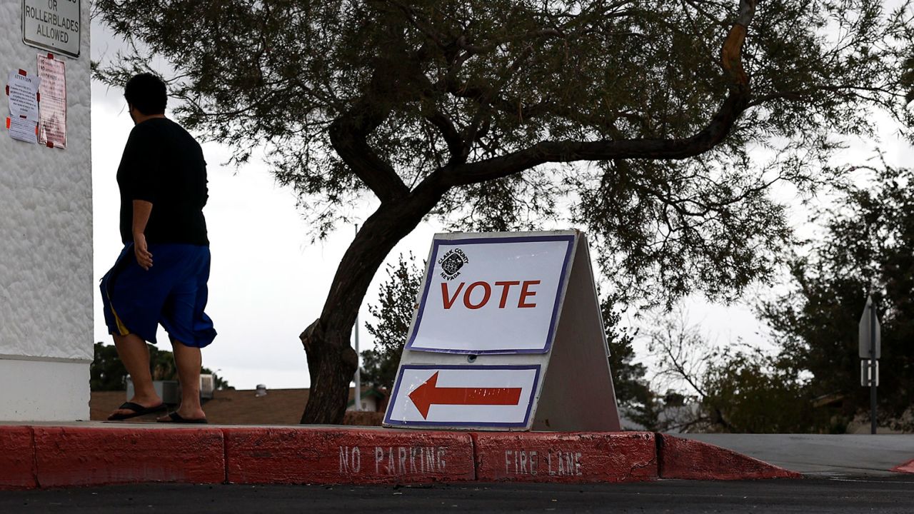  A voters arrives at a polling center at Doris Reed Elementary School on November 08, 2022 in Las Vegas, Nevada.