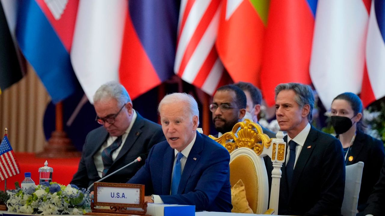 U.S. President Joe Biden, foreground, speaks during the ASEAN - U.S. summit in Phnom Penh, Cambodia, Saturday, Nov. 12, 2022. (AP Photo/Vincent Thian)