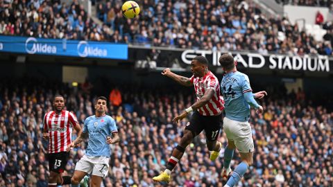 Toney scores his team's first goal.