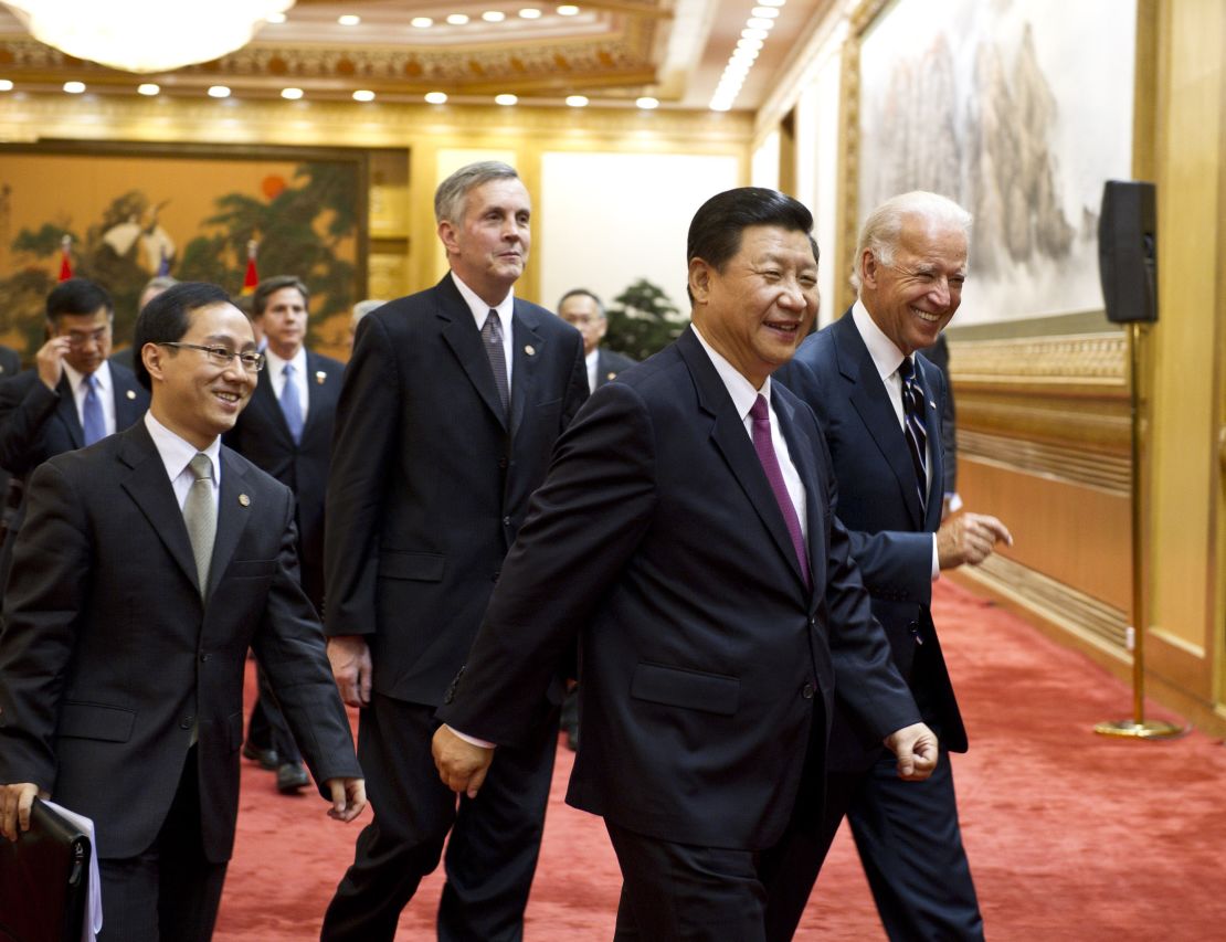 Xi Jinping and Joe Biden meet in Beijing in 2011.