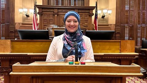 Representative selected Ruwa Romman at the Georgia State Capitol for her new member orientation.