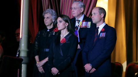 Britain's Prince William, right, and Catherine, Princess of Wales, center, attend the annual Festival of Remembrance at the Royal Albert Hall in London, November 12, 2022. 