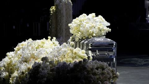 A view of Takeoff's flower-covered casket during the service