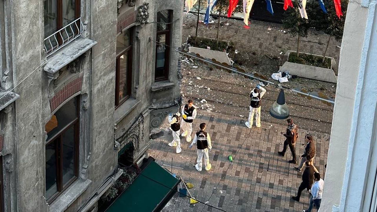 Turkish police and explosives experts work the scene of the explosion Sunday.