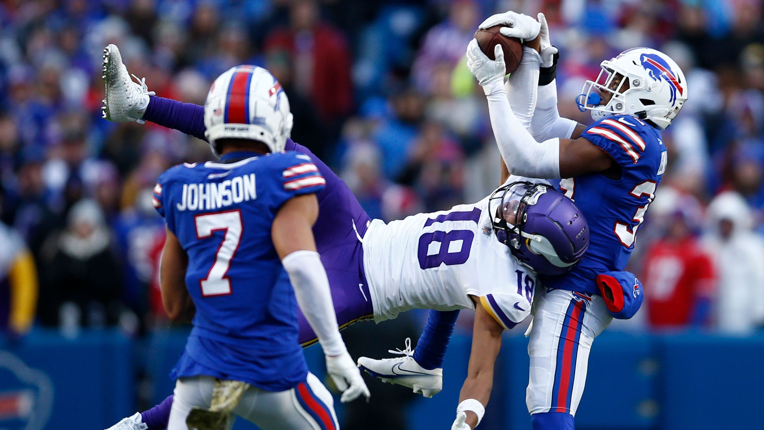 Justin Jefferson catches arguably the pass of the year in front of the Bills' Cam Lewis during the fourth quarter at Highmark Stadium in Buffalo. Jefferson had a monster afternoon — finishing with 10 catches, 193 receiving yards and a touchdown — as the Vikings stunned the Bills 33-30 in overtime to go to 8-1 on the year. 