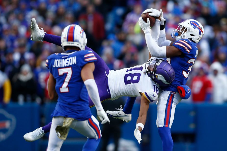 Justin Jefferson catches arguably the pass of the year in front of the Bills' Cam Lewis during the fourth quarter at Highmark Stadium in Buffalo. Jefferson had a monster afternoon — finishing with 10 catches, 193 receiving yards and a touchdown — as the Vikings stunned the Bills 33-30 in overtime to go to 8-1 on the year. 