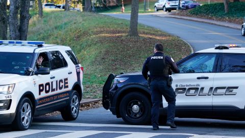 Police on Monday secure the crime scene of an overnight shooting at the University of Virginia in Charlottesville.